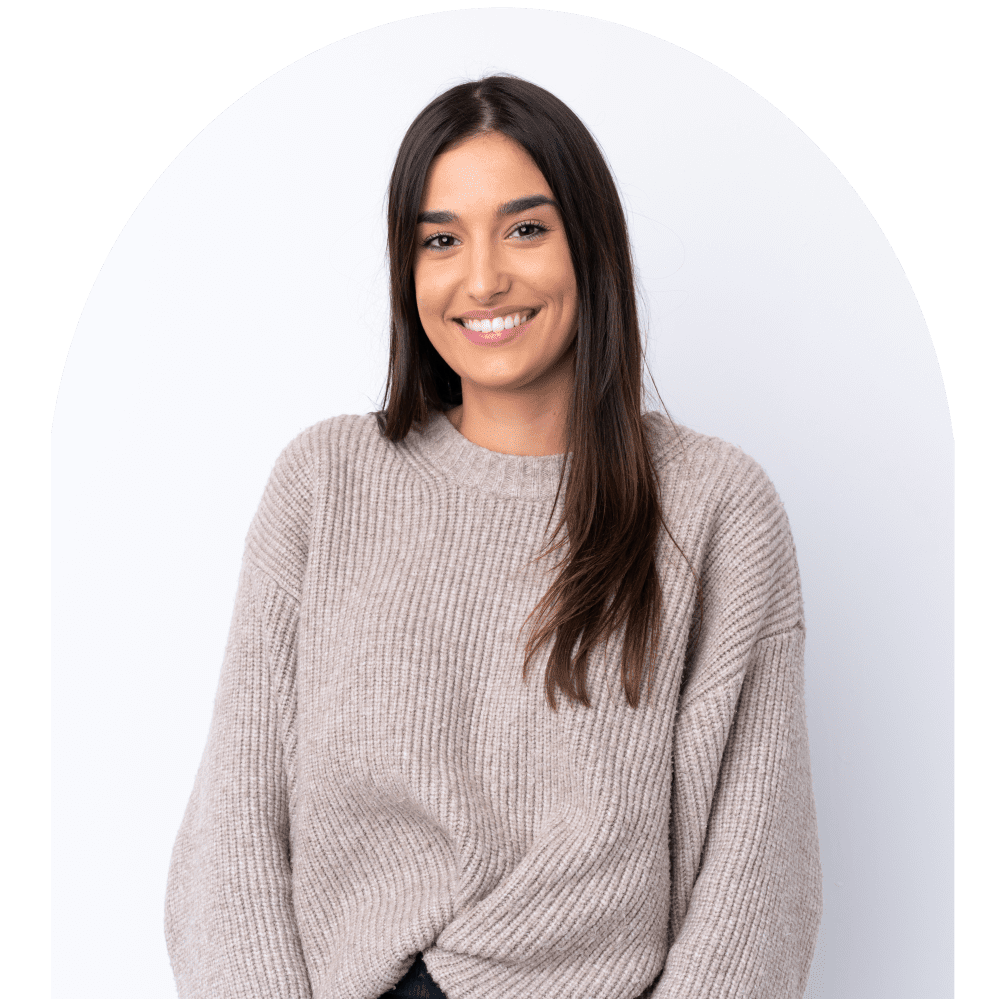 Woman smiling confidently at camera