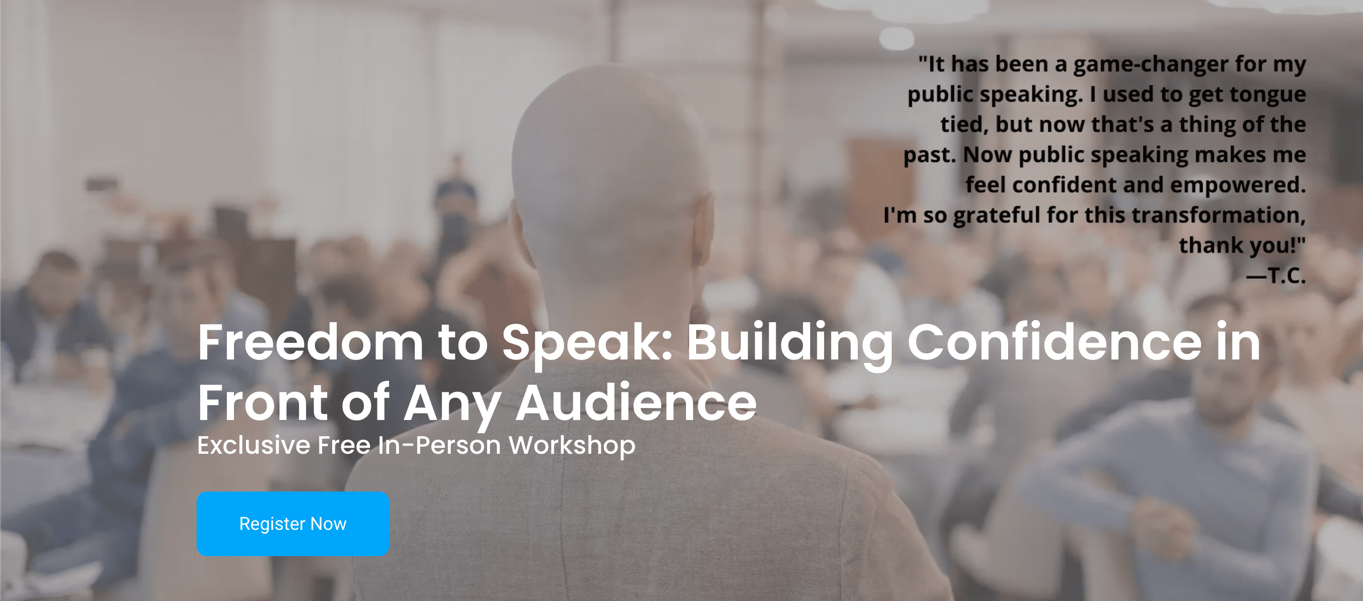 Confident man speaks in front of crowd